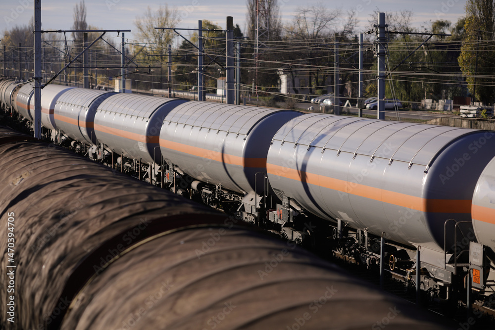 Oil, gas and liquefied petroleum gas (LPG, LP gas, or condensate) freight train wagons in a station near Bucharest, Romania. Oil, gas and liquefied petroleum gas (LPG, LP gas, or condensate) freight train wagons in a station near Bucharest, Romania.