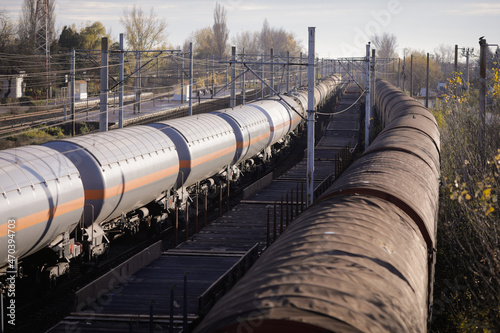Oil, gas and liquefied petroleum gas (LPG, LP gas, or condensate) freight train wagons in a station near Bucharest, Romania.