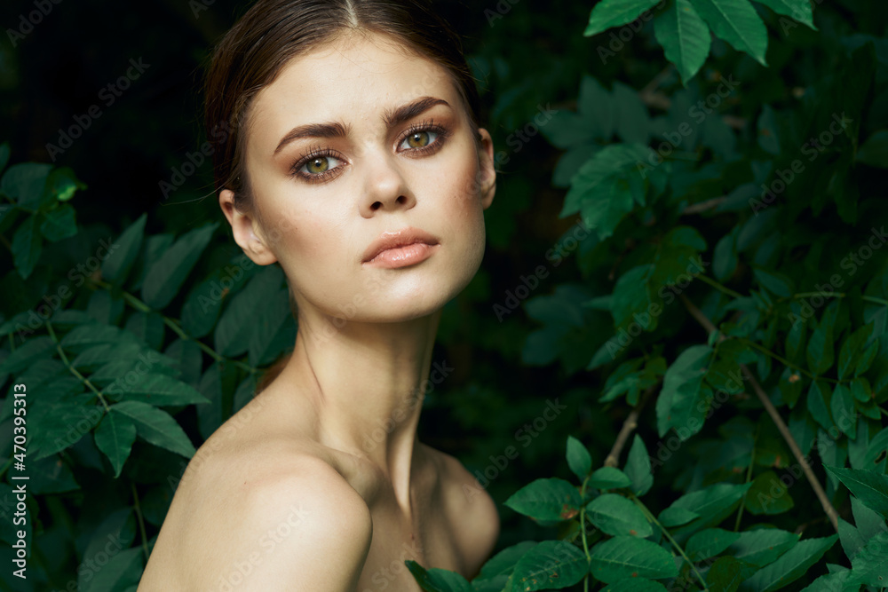 portrait of a woman green leaves clean skin nature summer model portrait of a woman green leaves clean skin nature summer model