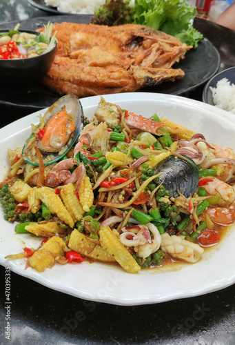 Fried stir spicy sea food Seafood Thai food a delicious fried menu of seafood