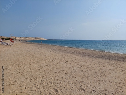 Beautiful bay in Marsa Alam  Egypt. Sandy beach and crystal clear sea. Walking along the beach.
