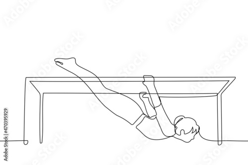 adult girl is engaged in pilates - one line drawing. sportswoman hanging upside down holding on to fitness simulator