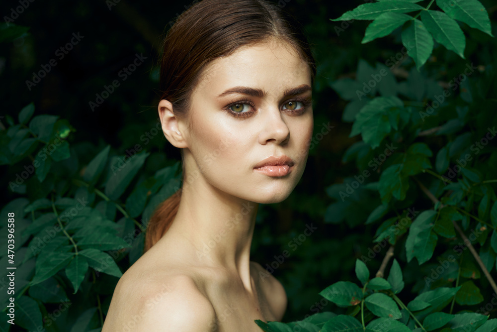 portrait of a woman green leaves clean skin nature summer Lifestyle portrait of a woman green leaves clean skin nature summer Lifestyle