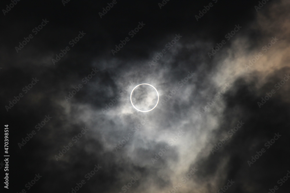 Solar Eclipse on a cloudy day taken in Japan. The clouds give it a very dramatic effect.