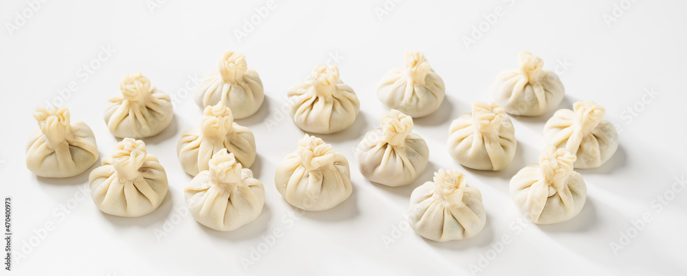 Homemade raw dumpling with chicken meat. Preparation chinese dumplings with meat and greens . Homemade raw dumpling with chicken meat. Preparation chinese dumplings with meat and greens .