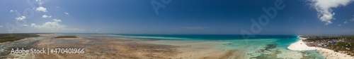 Tropical island of Zanzibar, Tanzania. Coastline, ocean and boats. Amazing nature and beautiful views