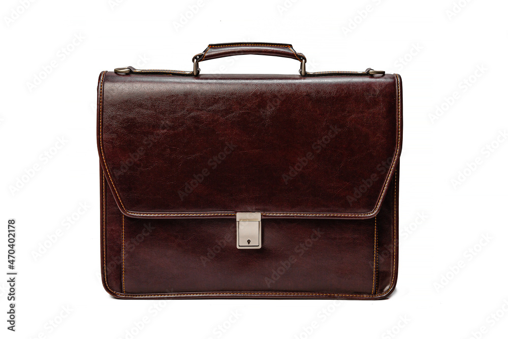 Brown leather briefcase on a white isolated background. Business accessories. Brown leather briefcase on a white isolated background. Business accessories.