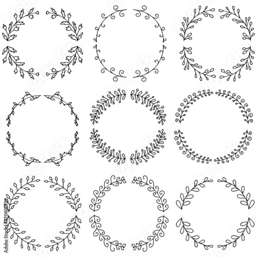 Vector illustration of hand drawn wreaths. Cute doodle floral wreath frame set.