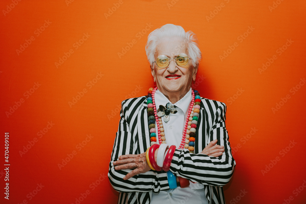 © oneinchpunch - Funny grandmother portraits. Senior old woman dressing elegant for a special event. granny fashion model on colored backgrounds