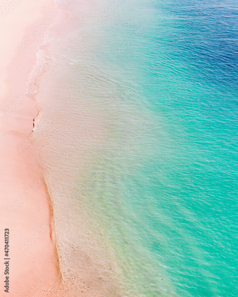 pink sand beach and blue ocean