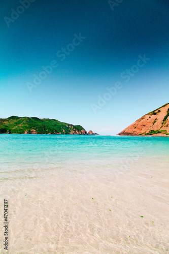 blue ocean and white sand beach in summer