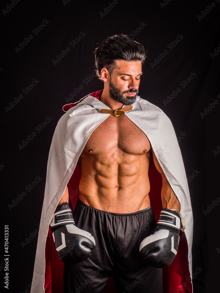 Handsome shirtless and muscular man with boxer's gloves Handsome shirtless and muscular man with boxer's gloves