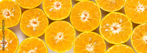 Top view fresh orange slices on white background