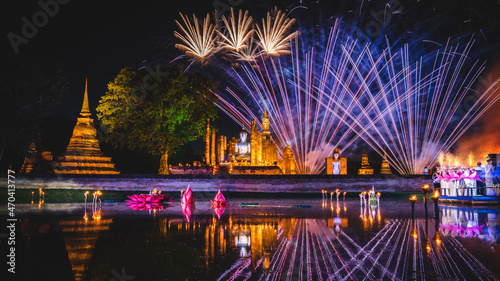 Firework at event of Loi Krathong festival showing in Sukhothai historical park, Thailand. photo