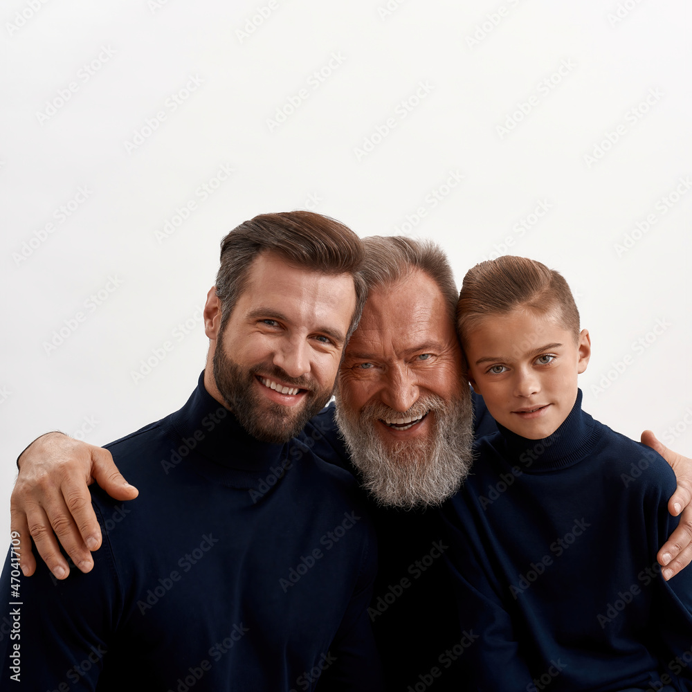 Crop portrait of three generations of men together