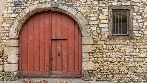 Antique door on a stone façade