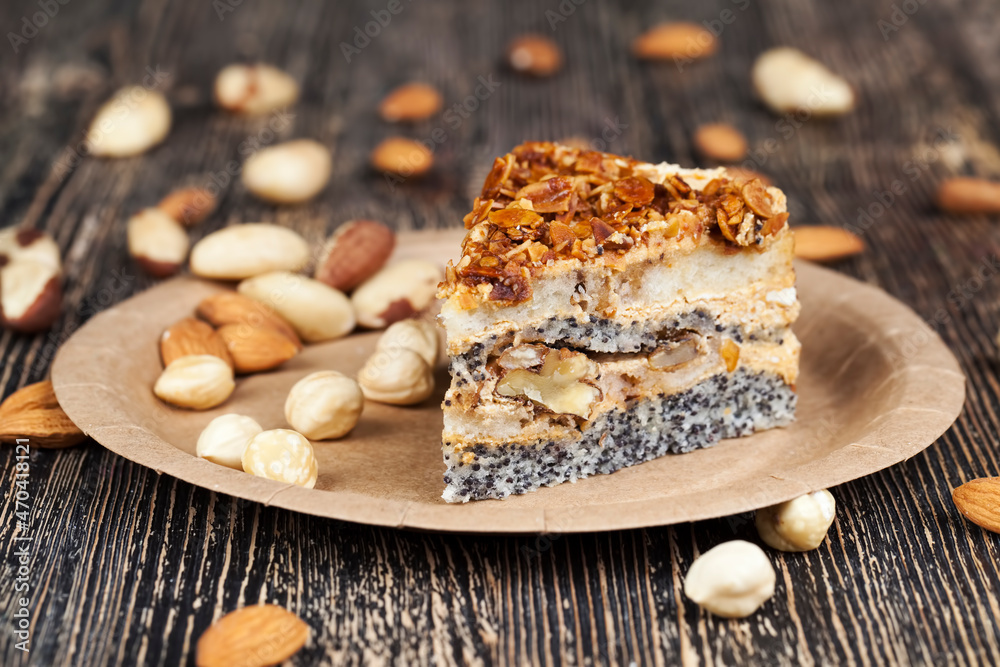 sweet cake with buttercream and sponge cake and lots of poppy seeds and nuts sweet cake with buttercream and sponge cake and lots of poppy seeds and nuts