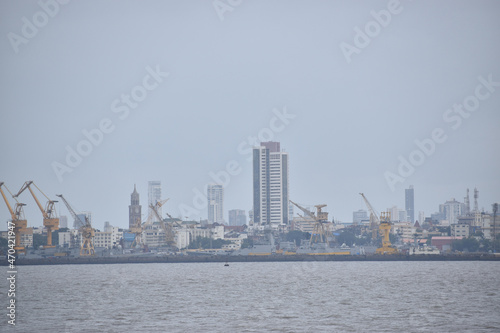 India 18 november 2021 Mumbai coast line with water in foreground and sky in background © deep