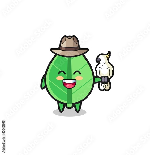 leaf zookeeper mascot with a parrot