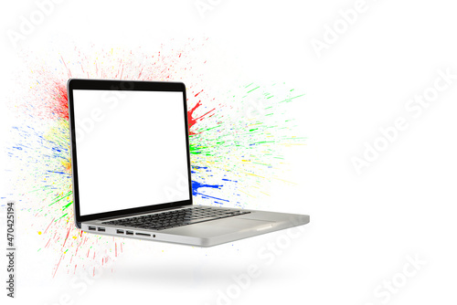 Calibration of laptop screen, monitor color, tablet or laptop. Modern laptop isolated on white with green screen. Multi-colored spray splashes in all directions.