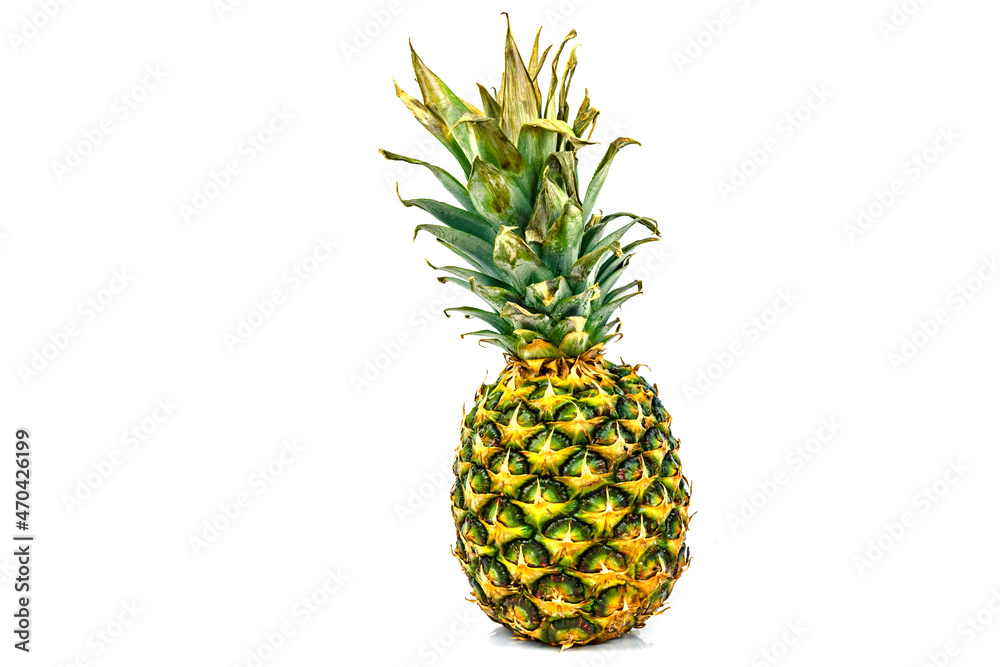 Fototapeta premium Whole ripe pineapple isolated on a white background