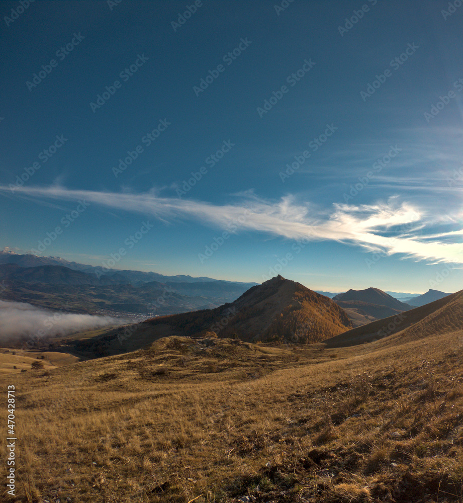 landscape with sea of clouds shot during a hike in peak of Gleize, Champsaur, french alps