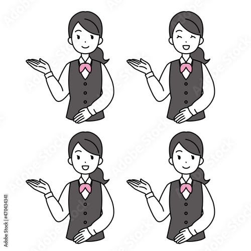 笑顔で案内する制服の女性