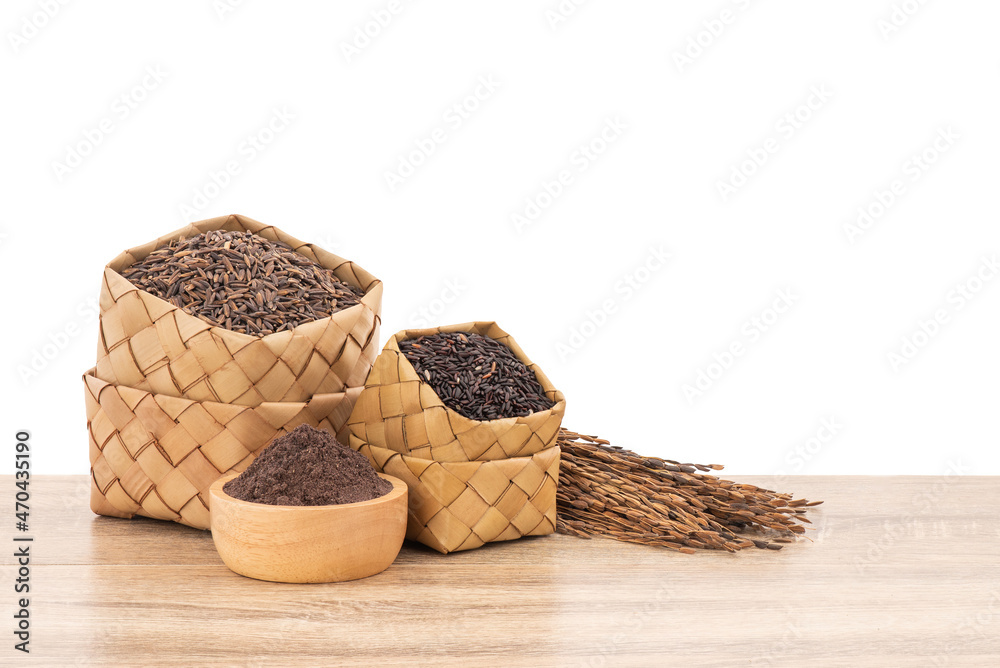 Rice berry,bran and seeds on wood table isolated on white background with clipping path.