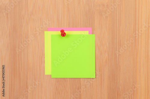 Colored Sticky Notes with Copyspace Pinned to the Wooden Message Board. To Do List Reminder in Office. Blank Memo Sticker at Work - Template. Empty Checklist - Mockup