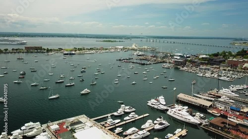 Aerial view of Bannister's Wharf Marina, Goat Island , yachts and Claiborne Pell Suspension Bridge in Newport, Rhode Island. photo