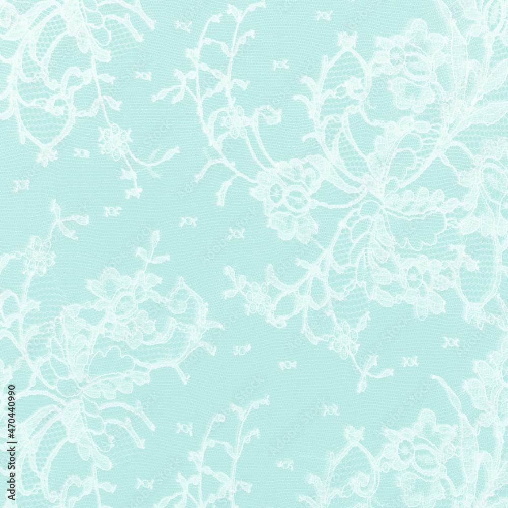 Mint green background with a subtle lace motif. A romantic background best for an invitation or wedding design. 