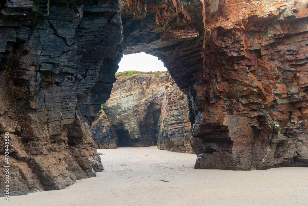 Rock tunnel on the beach of the cathedrals of Galicia