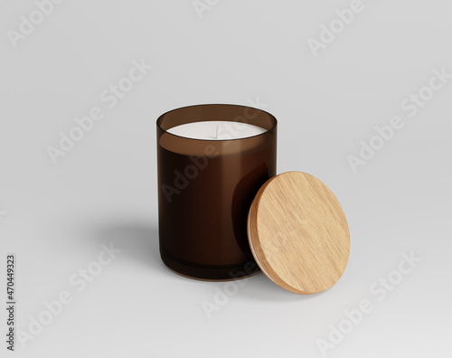 Scented soy candle in glass on the empty background