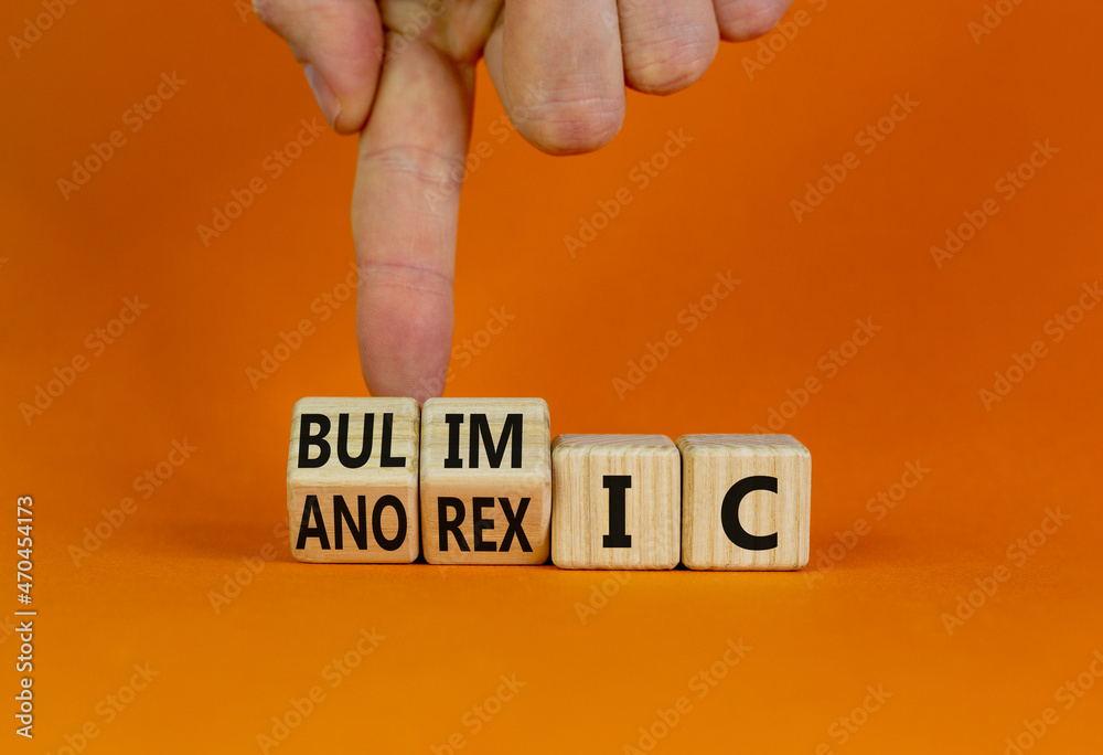 Bulimic or anorexic symbol. Doctor turns wooden cubes and changes the