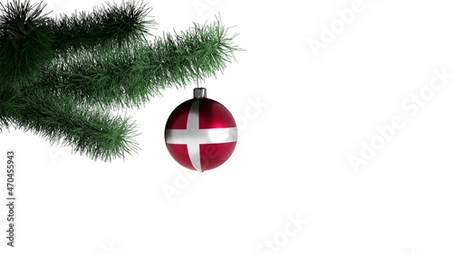 New Year's ball with the flag of Denmark on a Christmas tree branch isolated on white background. Christmas and New Year concept.