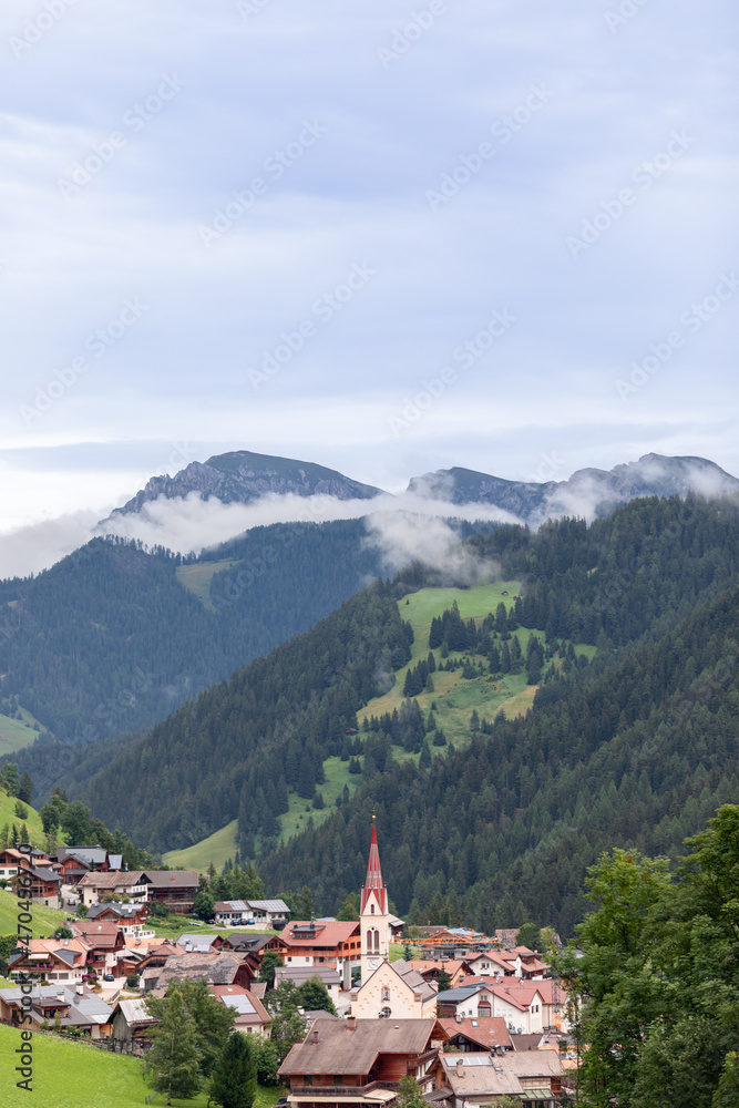 Beautiful view of small alpine town Longiaru (Campill) Val Pusteria, Alto Adige, Italy