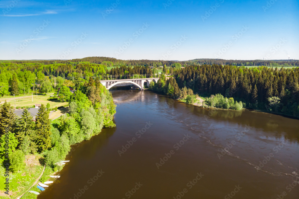 Summer aerial view of bridge and Kymijoki river waters in Finland, Kymenlaakso, Kouvola, Koria