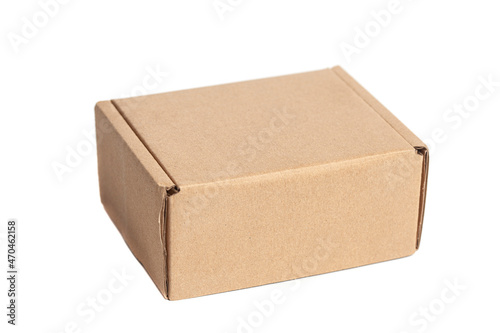 Closed cardboard box isolated on a white background © yurchello108
