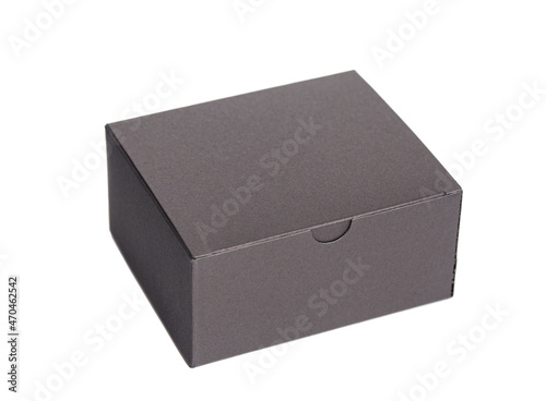 Black closed cardboard box isolated on a white background
