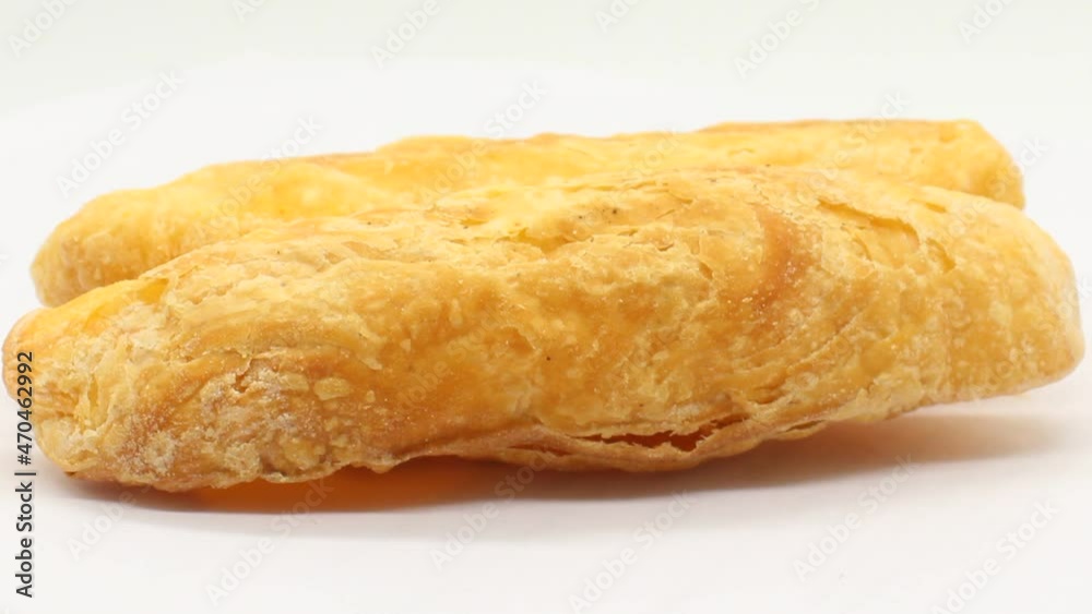 Baguette on white background with selective focus Baguette on white background with selective focus