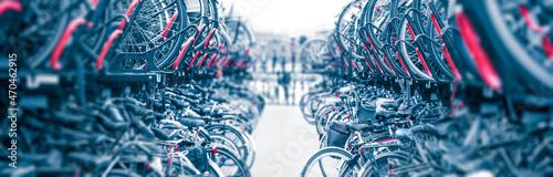 Bicycles Background - Public city bike parking. Eco-friendly transport for a healthy life. Bicycle parking