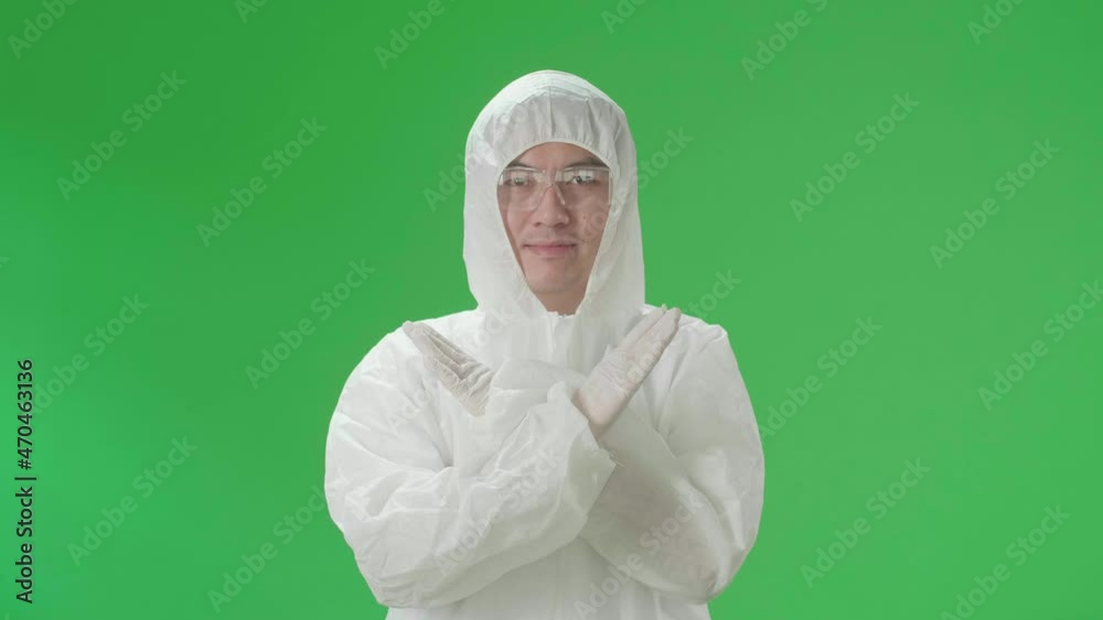 Asian Man Wearing Personal Protective Equipment Uniform Ppe And Showing Stop Sign In The Green Screen Studio
Asian Man Wearing Personal Protective Equipment Uniform Ppe And Showing Stop Sign In The Green Screen Studio