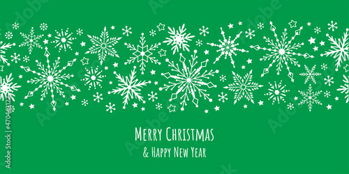 White snow falling on blue sky. Seamless background pattern. Snowflakes design for christmas greeting card banner od package