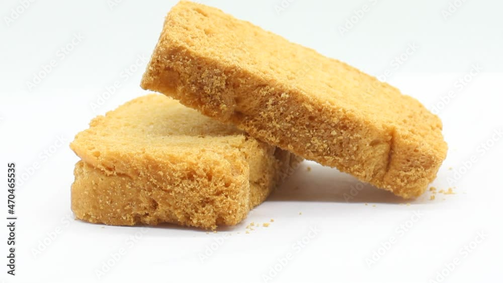 Crispy rusk on white background with selective focus Crispy rusk on white background with selective focus