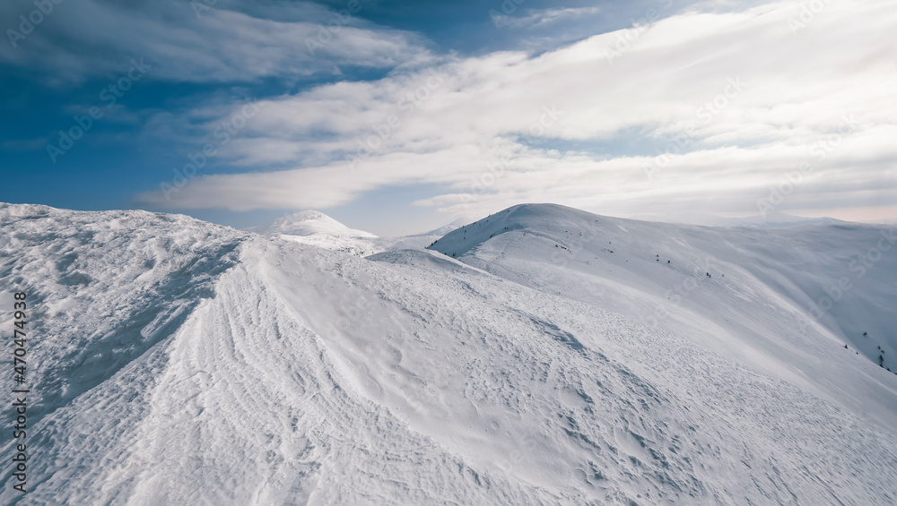 Very beautiful winter landscape in snowy mountains. Dramatic wintry scene. Panoramic view. Christmas holiday concept. Carpathians mountain, Ukraine.