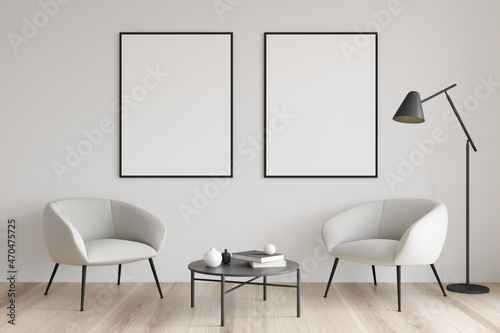 Fototapeta Naklejka Na Ścianę i Meble -  Living room with two canvases in modern white seating area