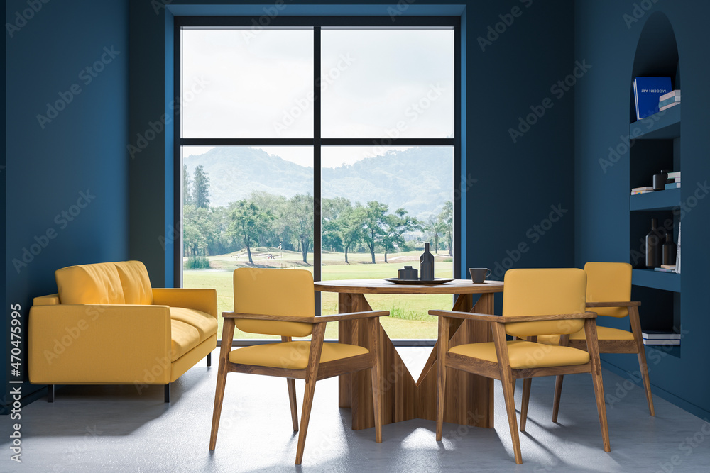 Fototapeta premium Blue and yellow dining room with sofa