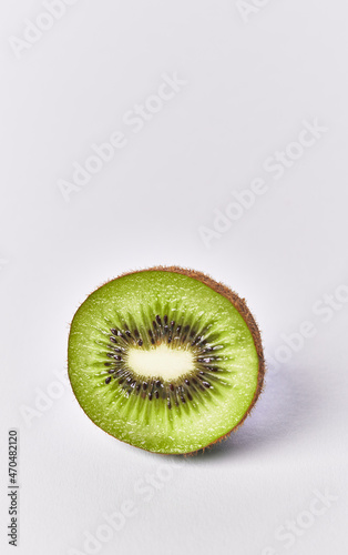 Fototapeta Slice of kiwi isolated on a white background