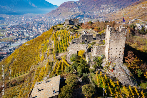 Castel Grumello and vineyards, near Sondrio in Valtellina, autumn aerial view photo