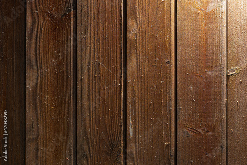 The background is made of textured wooden boards. The beautiful texture of wood fibers and the pattern on the boards, the walls of the bath (sauna).